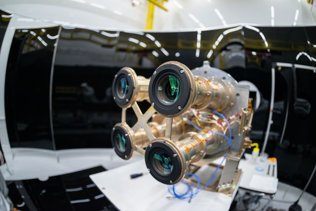 This preflight image shows the four Atmospheric Waves Experiment (AWE) telescopes at Space Dynamics Laboratory (SDL) facilities on Utah State University's Innovation Campus. (Courtesy of SDL/Allison Bills)