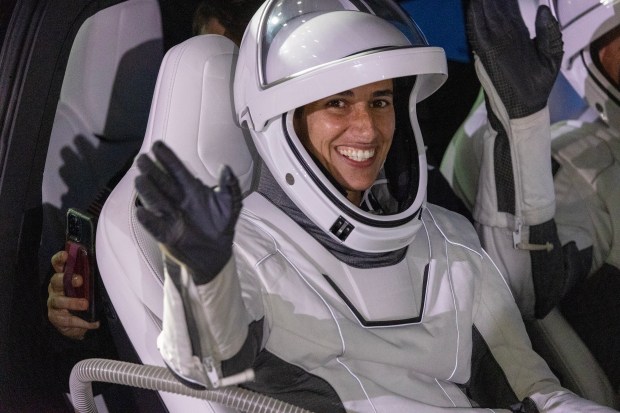 NASA astronaut Jasmin Moghbeli, commander of NASA's SpaceX Crew-7 mission, waves to her loved ones on the way to the launchpad, on Saturday, August 26, 2023. (Ricardo Ramirez Buxeda/ Orlando Sentinel)