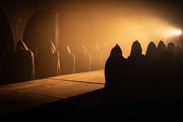 Hooded figures create a striking scene in "Nosferatu" at the Renaissance Theatre in Orlando. (Courtesy Andrew Tolbert via Renaissance Theatre Co.)