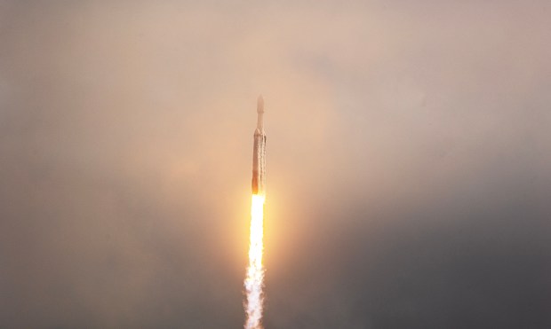 A SpaceX Falcon Heavy rocket launches NASA's Psyche asteroid mission from launchpad LC-39A at the Kennedy Space Center on Friday, Oct. 13, 2023. (Ricardo Ramirez Buxeda/ Orlando Sentinel)